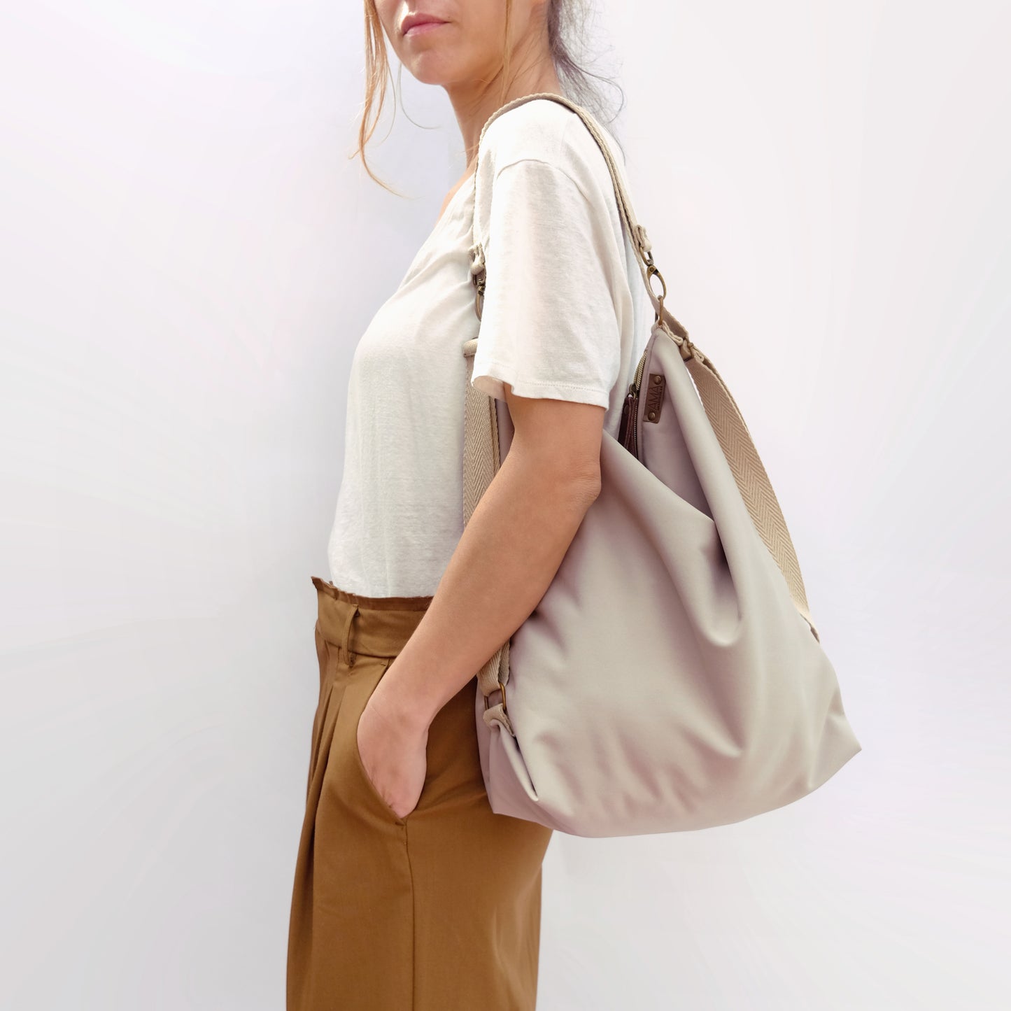 Coimbra Beige Impermeable (convertible en mochila)