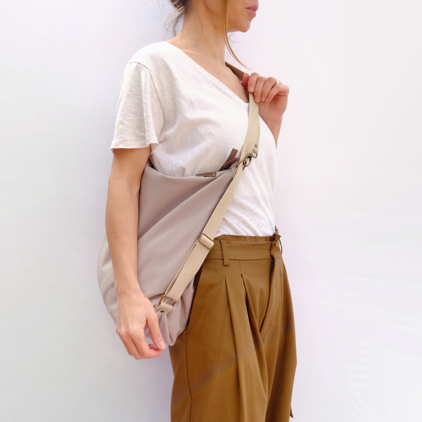 Coimbra Beige Impermeable (convertible en mochila)