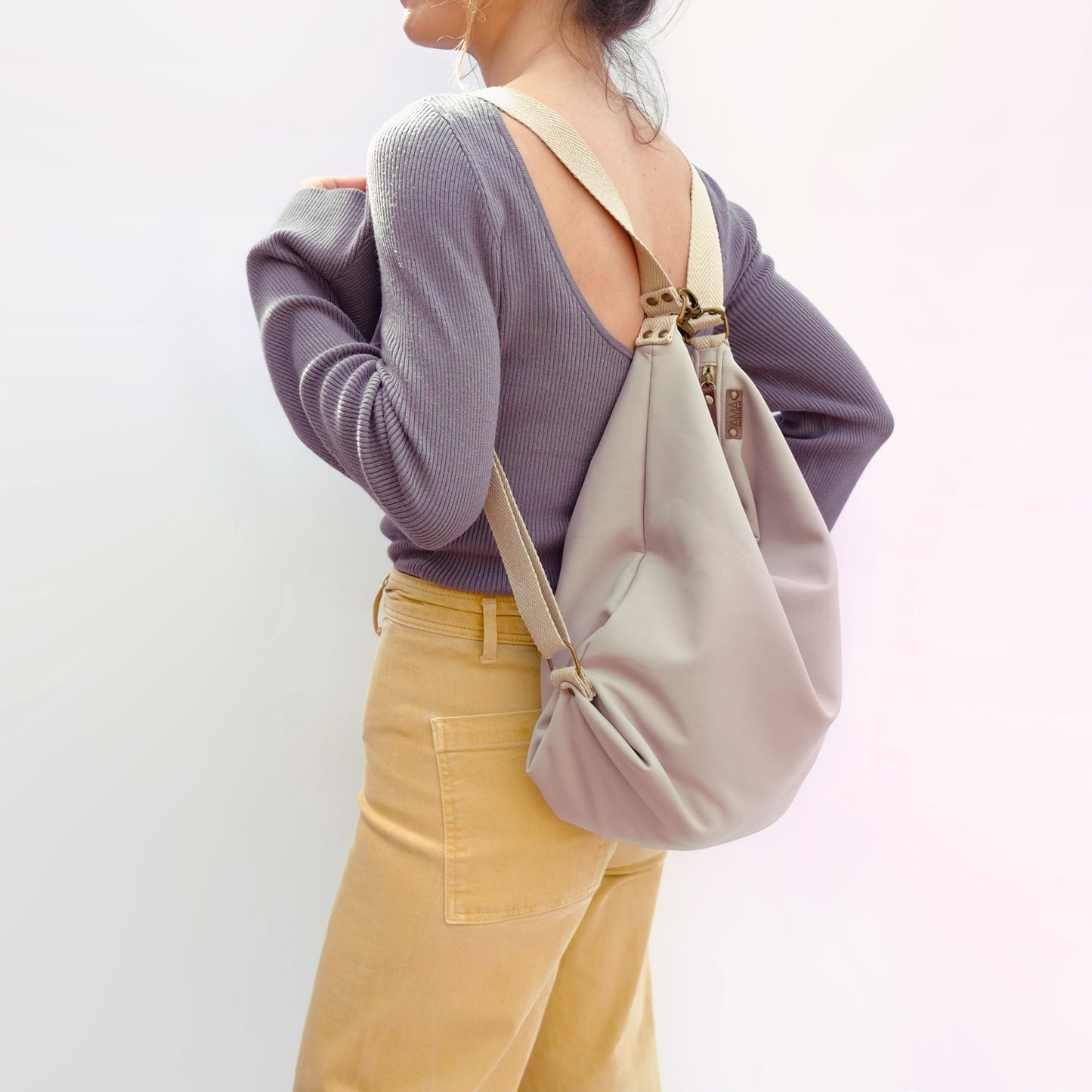 Coimbra Beige Impermeable (convertible en mochila)