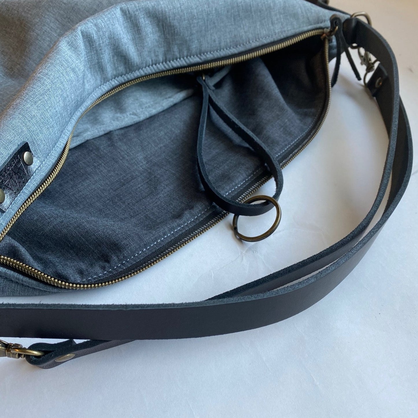 Coimbra Gris Claro Impermeable (convertible en mochila)