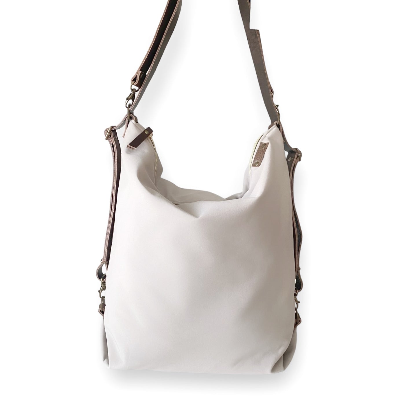 Coimbra Beige Impermeable (convertible en mochila)