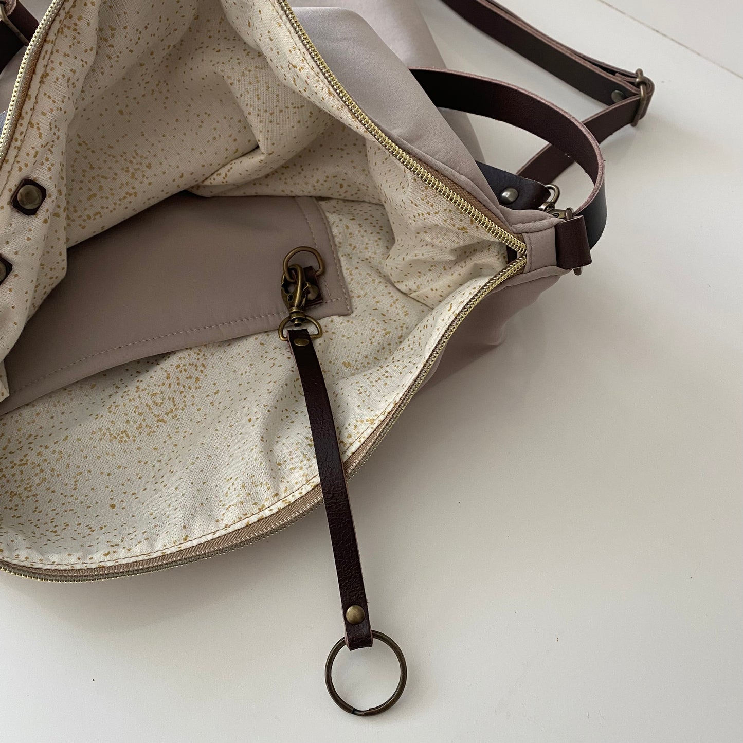 Coimbra Beige Impermeable (convertible en mochila)