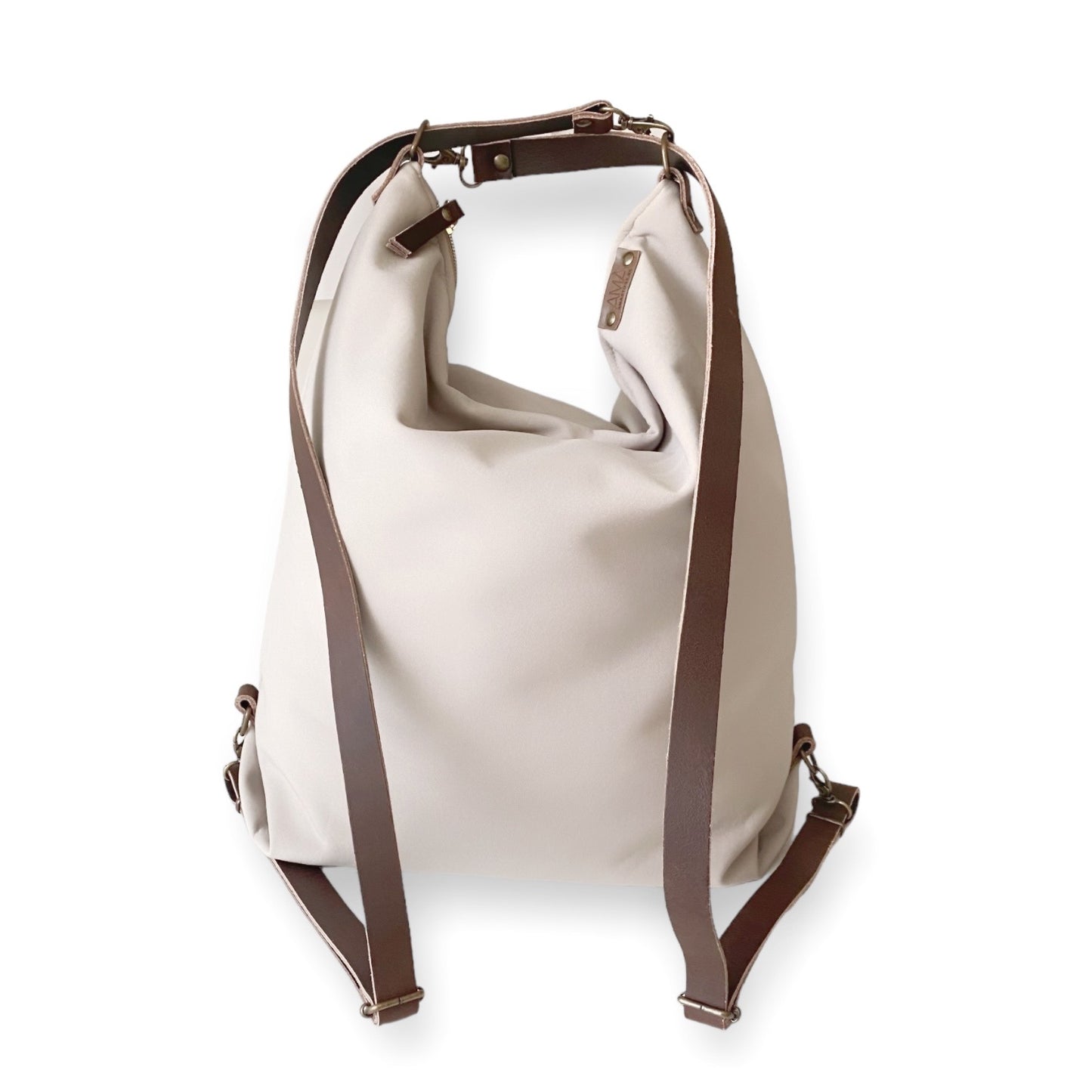 Coimbra Beige Impermeable (convertible en mochila)