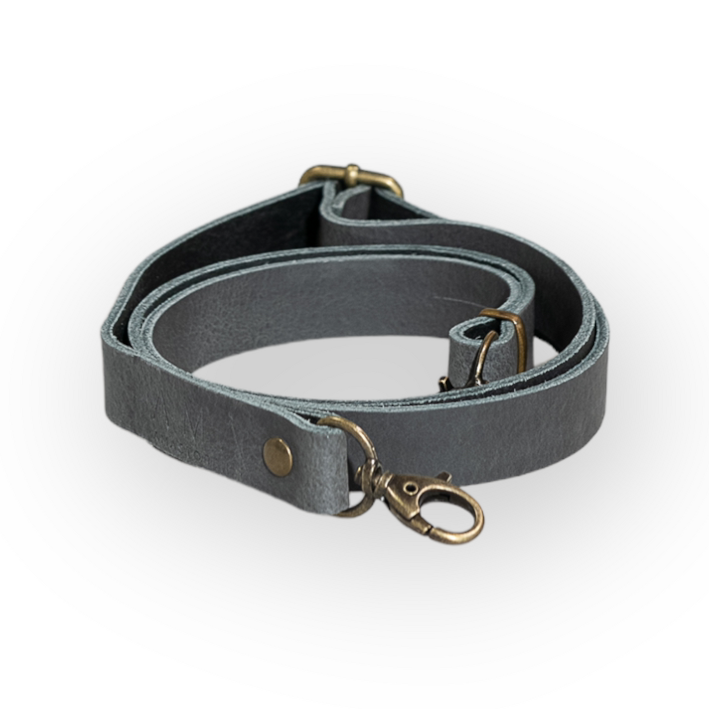 Correa bolso cuero gris hecha a mano. Combina tu bolso con diferentes correas hechas a mano para darle personalidad a tu riñonera o bolso. Las asas están realizadas de algodón reciclado o de piel vaquetilla y regulador y 2 mosquetones en Oro Viejo.