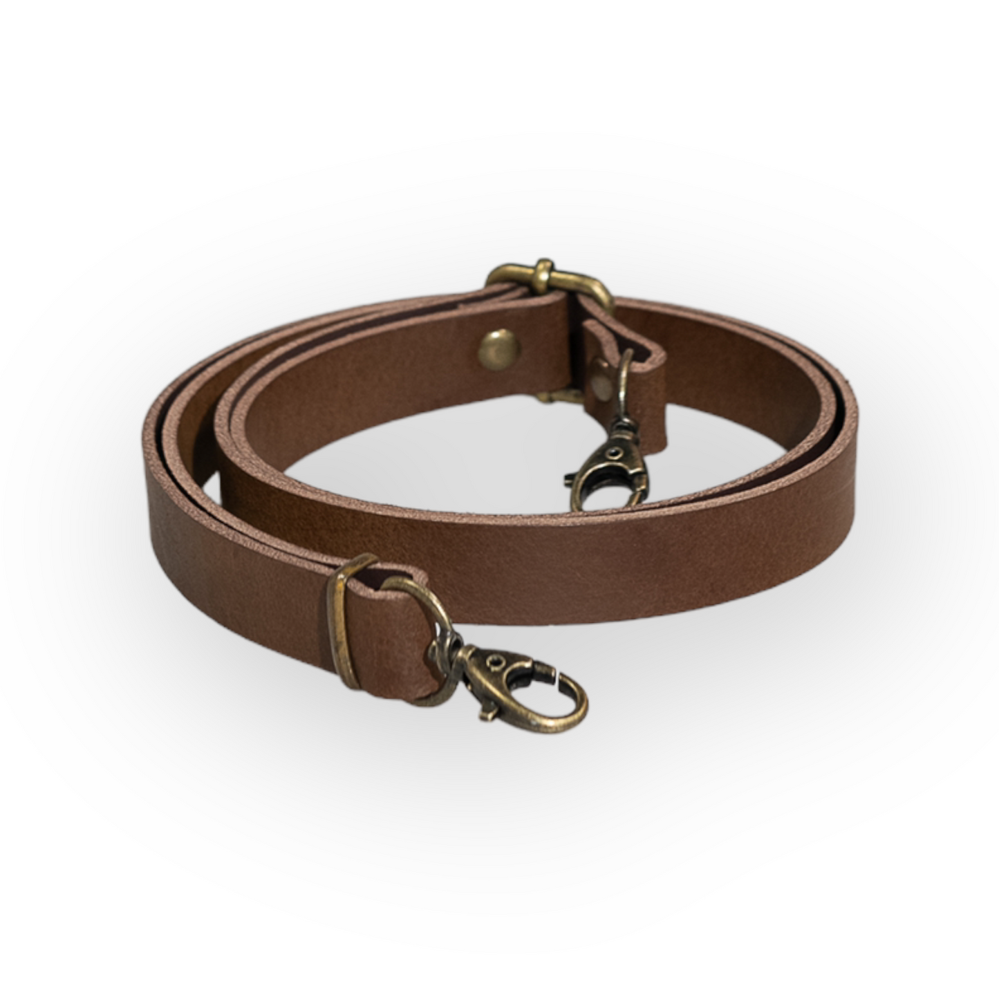 Correa bolso marrón cuero vaquetilla. Combina tu bolso con diferentes correas hechas a mano para darle personalidad a tu riñonera o bolso. Las asas están realizadas de algodón reciclado o de piel vaquetilla y regulador y 2 mosquetones en Oro Viejo.
