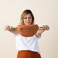 Riñonera de tejido softshell impermeable con cintas intercambiables. Hechas a mano en Barcelona. Color teja caramelo