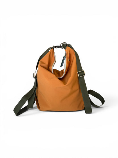 Coimbra  caramelo  Impermeable (convertible en mochila)